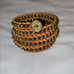 Yellow and orange coil-like bracelet